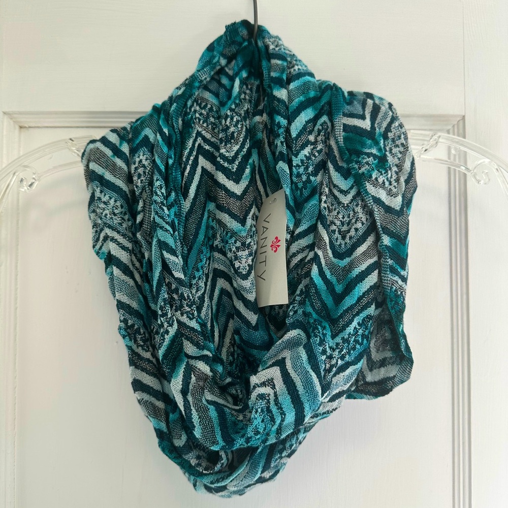4/$20 DEAL ON ANY BUNDLE OF SCARVES
Vanity Chevron Knit Scarf - Teal and Black